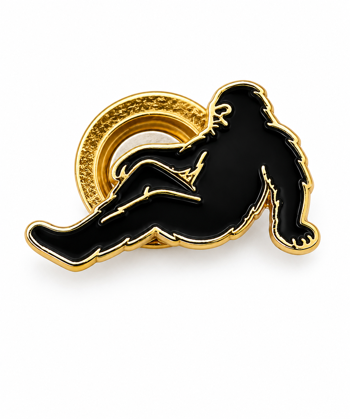 Resting Bigfoot magnet pin attached to hat shirt or backpack